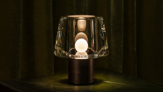 Occhio Era table luminaire with glass cone head and leather body