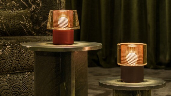 Occhio table luminaire with mesh glass cone and leather body