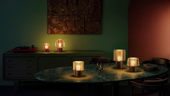 Occhio Era lusso Design cordless luminaire battery light glas on table and sideboard