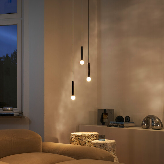 Occhio Coro moon sospeso in contemporary living room