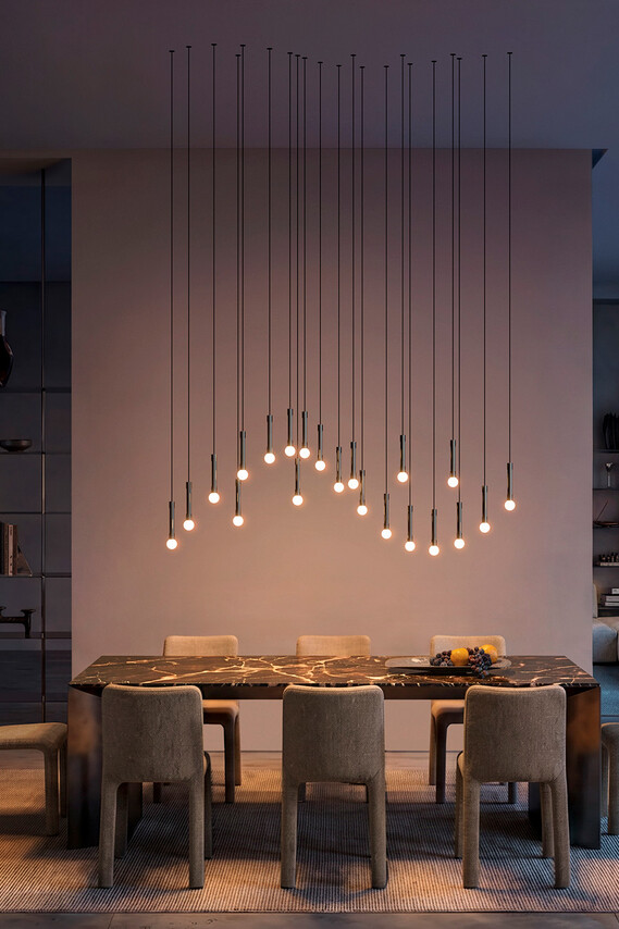 Occhio Coro moon wave luminaire skulpture design luminaire construction over dinner table