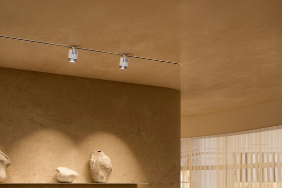 Occhio lui pico pro power spot luminaire in commercial space