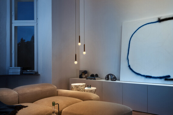 Occhio Coro moon sospeso in contemporary living room
