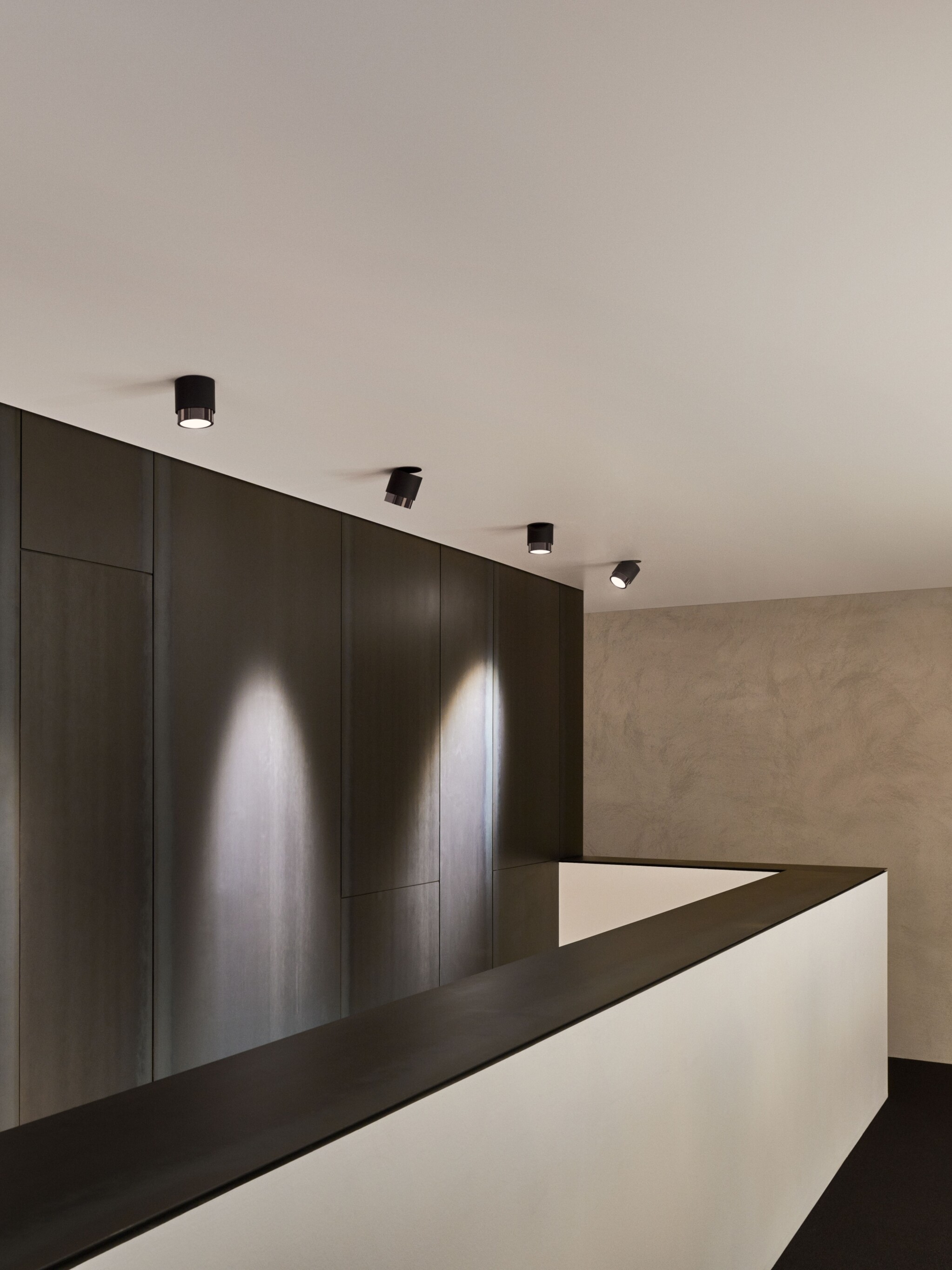 lui alto ceiling spotlight illuminating corridor