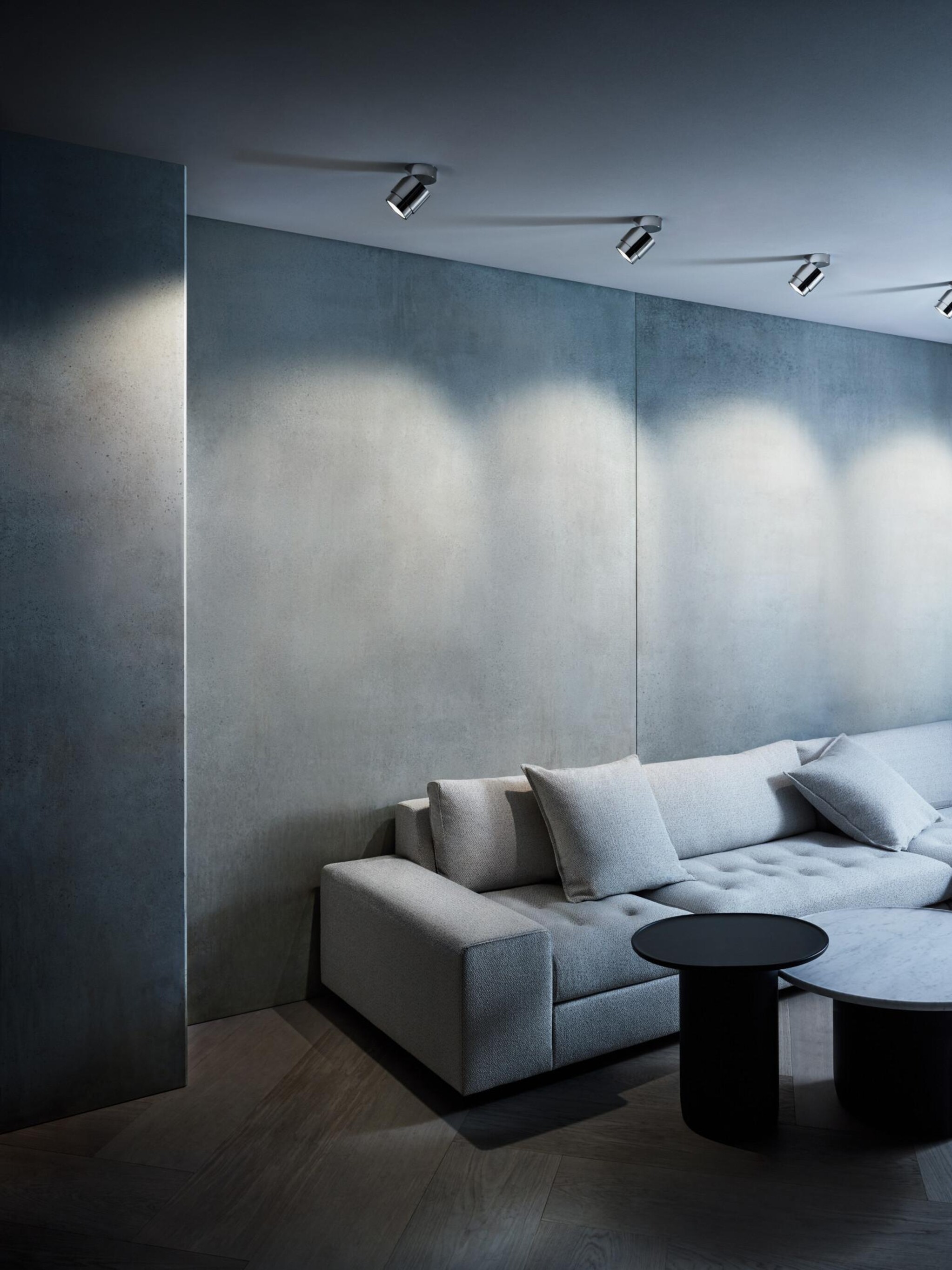 lui volto chrome spotlight in living room setting
