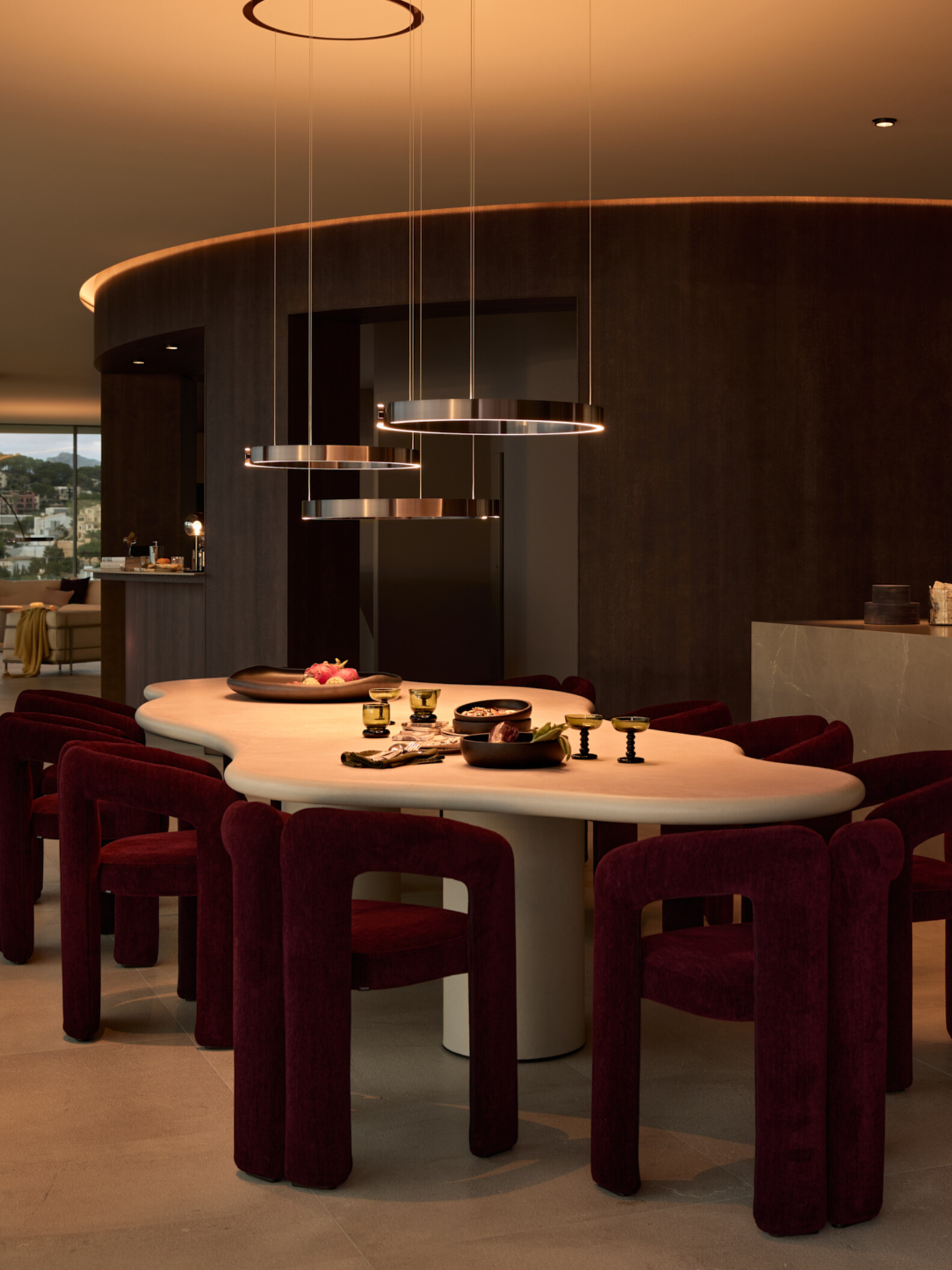 Occhio Mito cosmo move pendant luminaire over dining table in Mallorca villa - luxury dining light available in Dubai