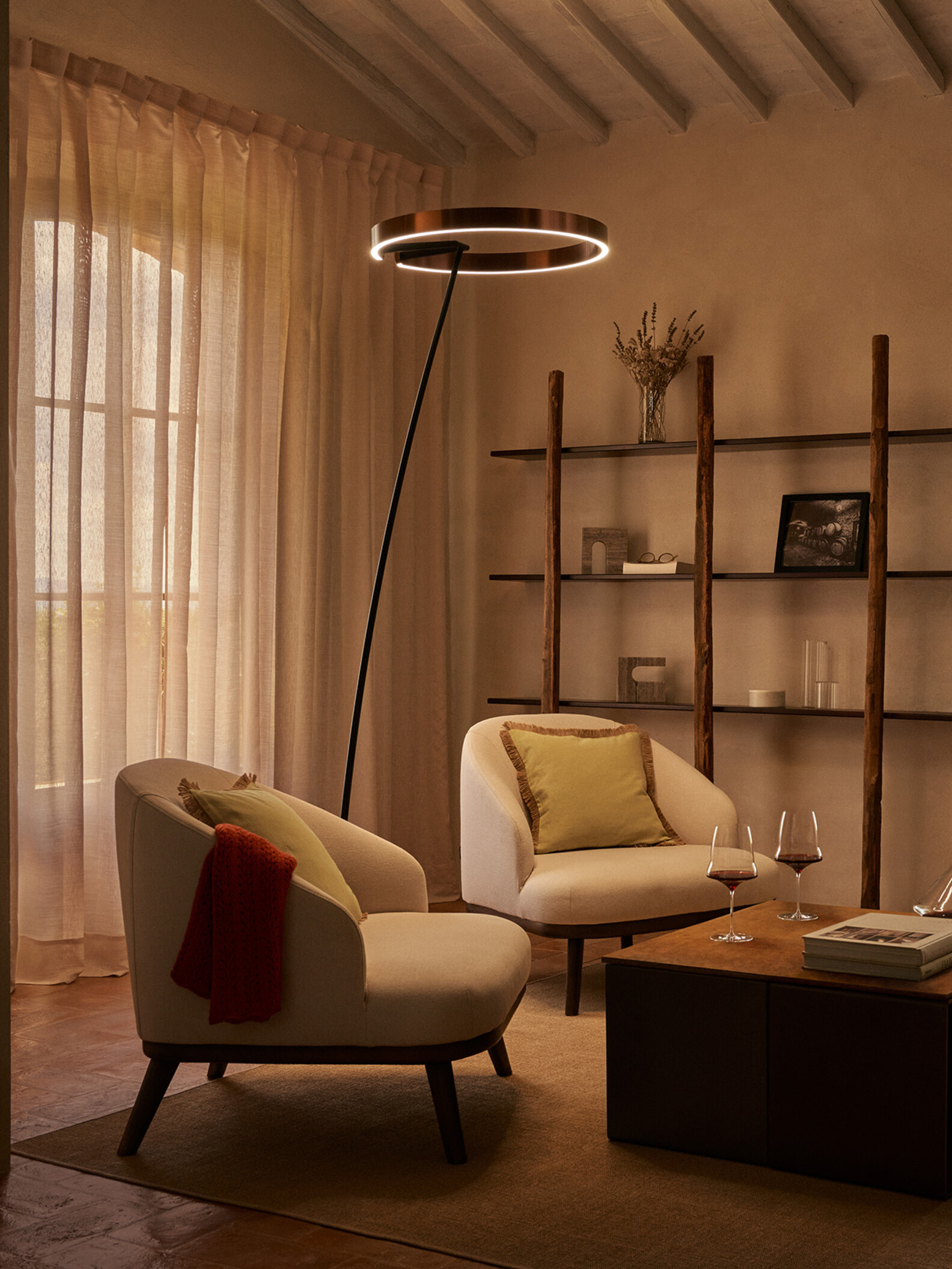 Occhio Mito raggio floor luminaire in multiple living room settings - dark chrome and matte finishes available in Dubai
