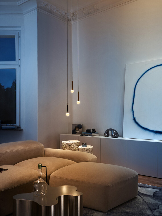 Occhio Coro moon sospeso in contemporary living room
