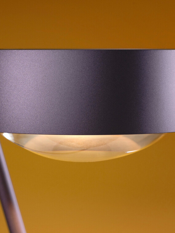 Occhio Sento tavolo table luminaire on yellow backround close up