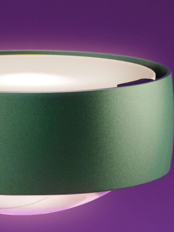 Occhio sento lettura table luminarie on purple backround close up