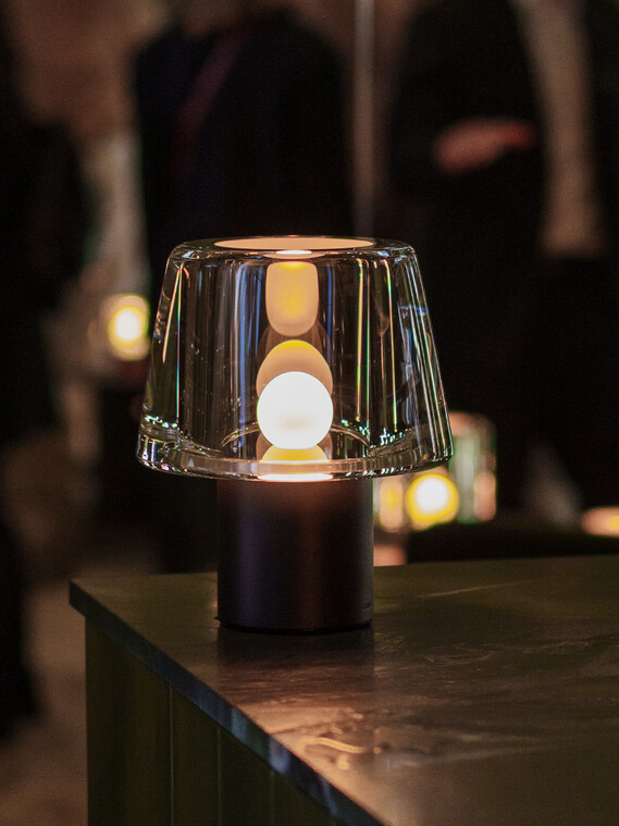 Milan Design Week Occhio Era pure cordless glass luminaire on table