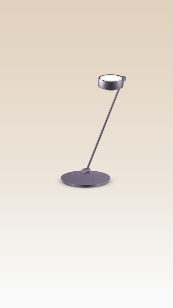 Occhio Sento tavolo table luminaire on beige backround