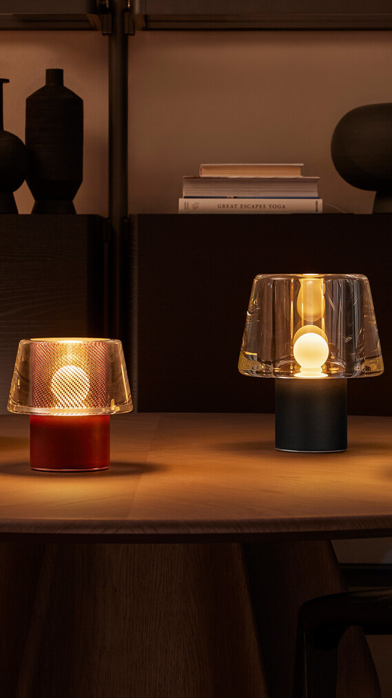 Occhio era and era lusso glass table luminaire metal mesh on dinner table
